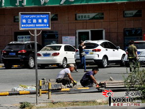 便民服务亭引发争议 乌市一小区停车位改造引百名业主阻工